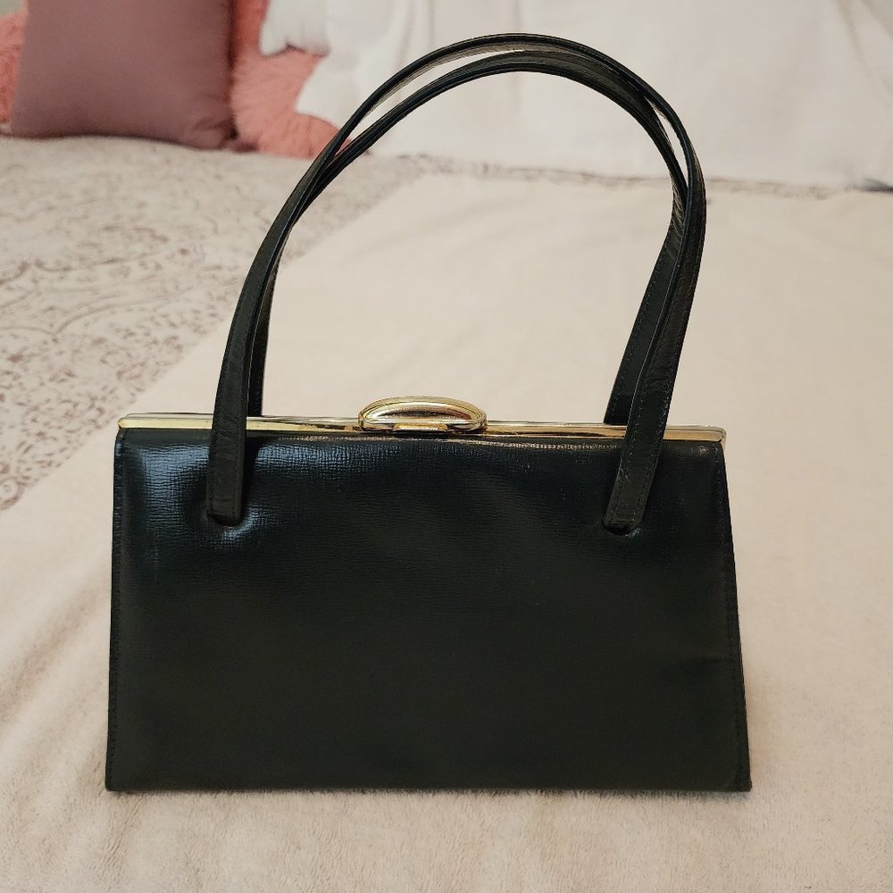 Elegant vintage deep blue shoulder bag with gold clasp